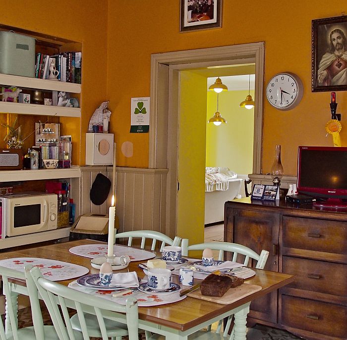 Dining table, microwave, TV